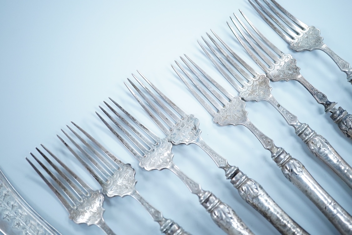 Eight Victorian silver fish forks and seven fish knives, by Hilliard & Thomason, Birmingham, 1878, with loaded unmarked white metal handles, one a plated replacement.